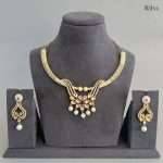 Ritvi Prakshi Kundan Meena Necklace Set