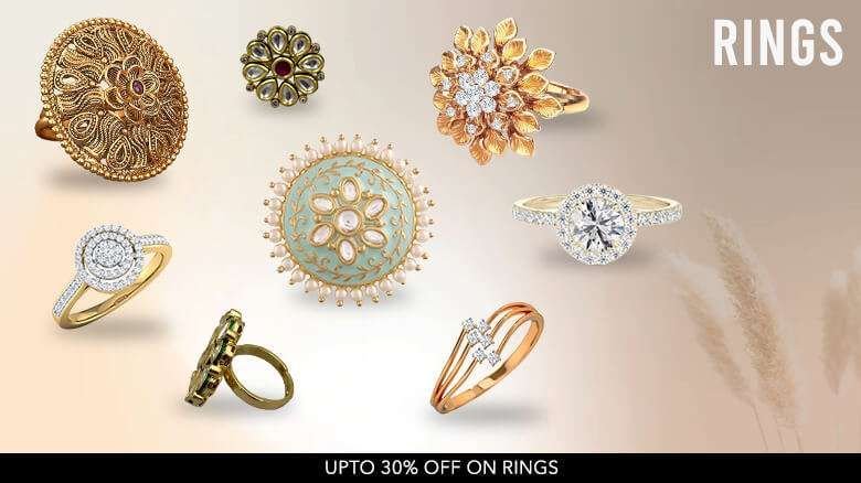 A promotional image featuring an assortment of rings, including gold, diamond, and gemstone designs, against a light background. The text reads "RINGS" in the upper right corner and "UPTO 30% OFF ON RINGS" at the bottom.