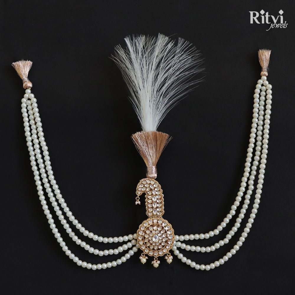 Ritvi-Sameer-Gold-Finished-Pearl-Kundan-Kalgi-1.jpg Ritvi Gold Finished Pearl Kundan Kalgi For Sikh - Image 1