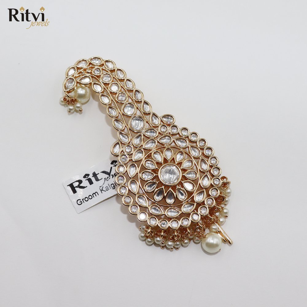 Samarth-1.jpg Ritvi Samarth Gold Finished Pearl Kundan Kalgi - Image 1