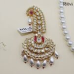 Ritvi Vedant Gold Finished Pearl Kundan Kalgi (Ruby)