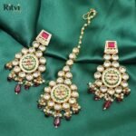 Athira kundan earrings with maang tika